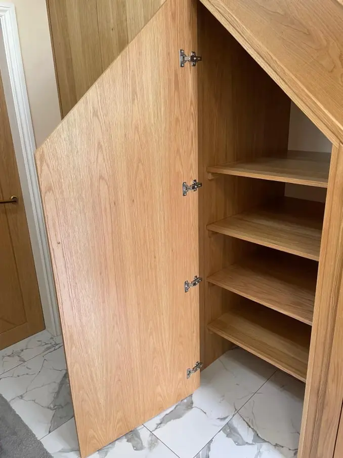 Before and after under stairs storage transformation by The Stair Shop